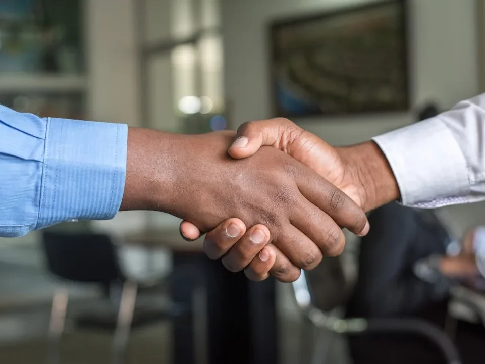 Bank Building Handshake Agreement - Pinjaman Jaminan Sertifikat Rumah