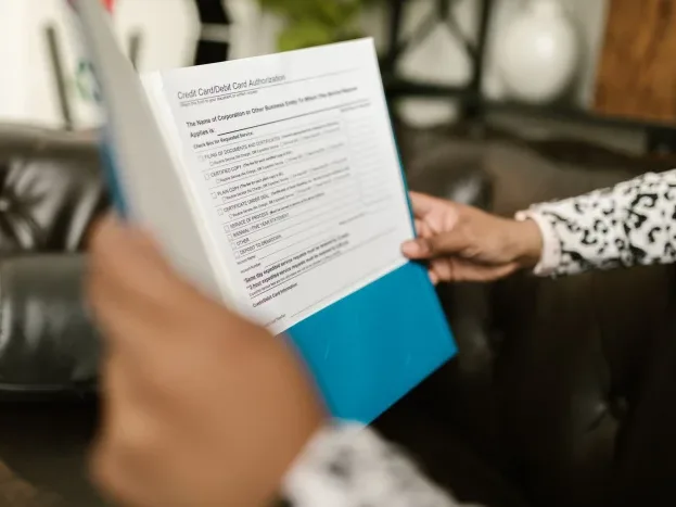 Document Hand Holding Card Money Bag - Asuransi Jiwa Syariah