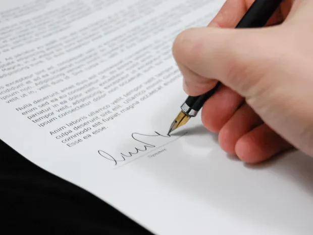 Hand Signing Document Bank Counter - Pinjaman BRI