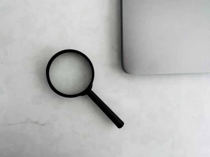 Insurance Documents Magnifying Glass - Dokumen Klaim Asuransi