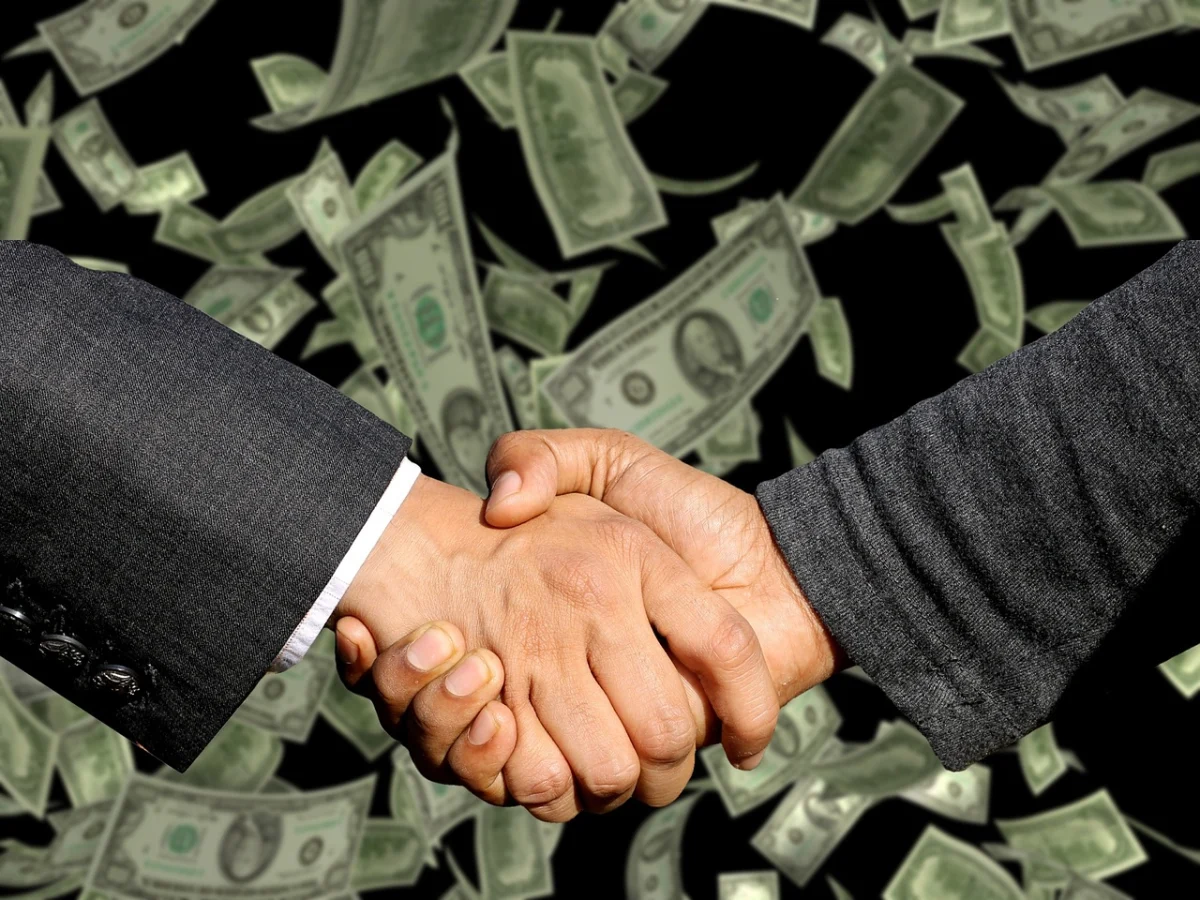 Success Handshake - Kredit Usaha Rakyat